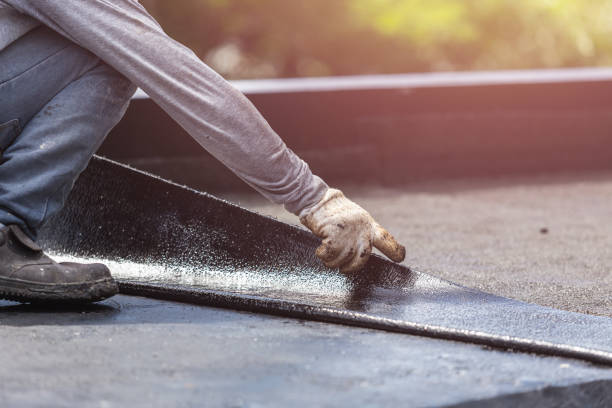 Professional Waterproofing technician working in Romeo, MI